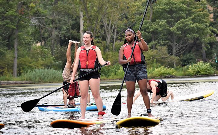 Image of Students Paddleboarding